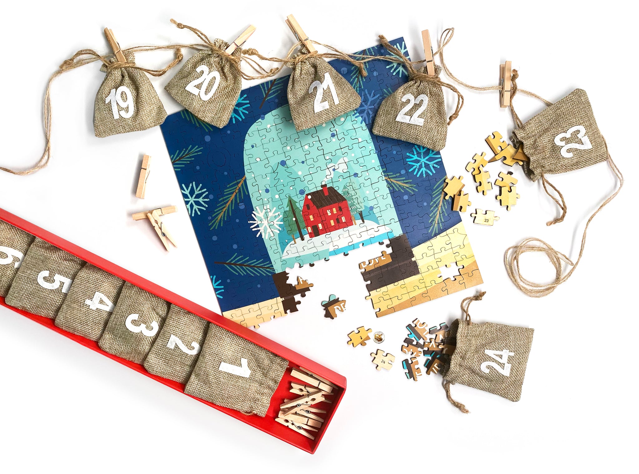 Modern Christmas puzzle with pouches, jute cord, wooden clips and retail packaging