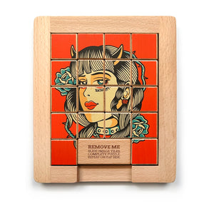 The front side of Dualities Wooden Sliding Puzzle: Naughty v. Nice 2 sided puzzle